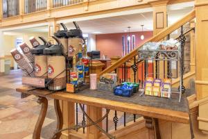a table with a bunch of food on it at AmericInn by Wyndham Sheboygan in Sheboygan