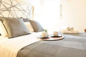 Posteľ alebo postele v izbe v ubytovaní P&P Apartaments Carrera de Capuchinos