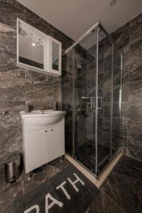 Koupelna v ubytování Apartments Vukman + 37 fotografií