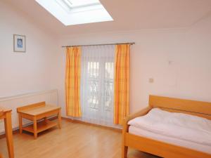 Ένα ή περισσότερα κρεβάτια σε δωμάτιο στο Privatzimmer Familie Schwarz
