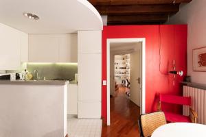 Kuchyňa alebo kuchynka v ubytovaní Anfiteatro Apartment in Brera