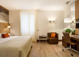 Postel nebo postele na pokoji v ubytování Starhotels Ritz