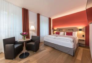 Postel nebo postele na pokoji v ubytování Hotel Fravi + 34 fotografií