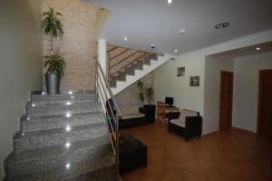 TV a/nebo společenská místnost v ubytování Hotel Rural Rocha da Gralheira