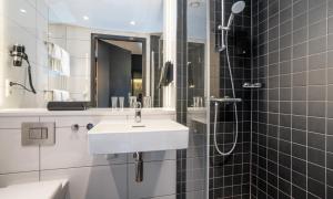 Koupelna v ubytování Thon Hotel Linne