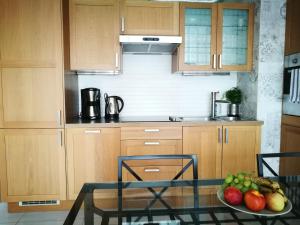 Kuchyň nebo kuchyňský kout v ubytování Apartament Sunrise Spacerowa by Noclegi Renters