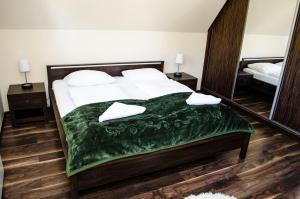 Łóżko lub łóżka w pokoju w obiekcie ZAKOHOME- Z Widokiem Na Tatry Cieniówka