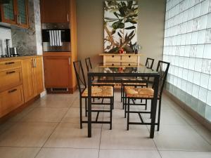 Kuchyň nebo kuchyňský kout v ubytování Apartament Sunrise Spacerowa by Noclegi Renters