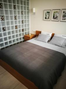 Postel nebo postele na pokoji v ubytování Apartament Sunrise Spacerowa by Noclegi Renters