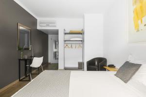 Postel nebo postele na pokoji v ubytování Hotel Umu