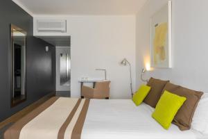 Postel nebo postele na pokoji v ubytování Hotel Umu