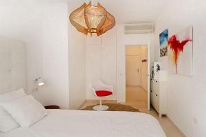 Posteľ alebo postele v izbe v ubytovaní San Juan FreshApartments