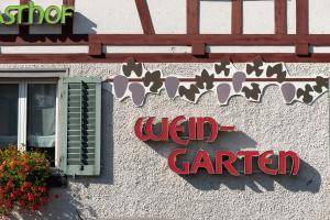 Ein Zertifikat, Auszeichnung, Logo oder anderes Dokument, das in der Unterkunft Gasthof Pizzeria Weingarten ausgestellt ist