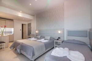 Postel nebo postele na pokoji v ubytování Tzante Hotel Zakynthos, Adults Only