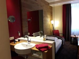 Postel nebo postele na pokoji v ubytování Hotel Post