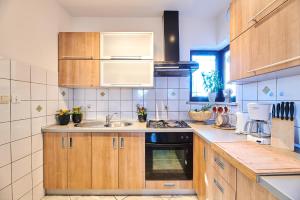 Kuchyň nebo kuchyňský kout v ubytování Apartments Noa