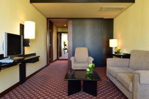 Uma TV ou centro de entretenimento em Pestana Casino Park Hotel & Casino