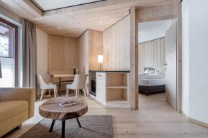 Postel nebo postele na pokoji v ubytování Hotel Garni Pirchhütt