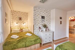 Postel nebo postele na pokoji v ubytování Apartment U Medvídka