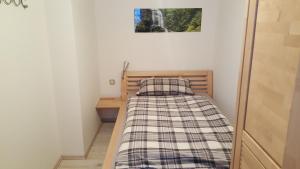Postel nebo postele na pokoji v ubytování Apartment Feldmann