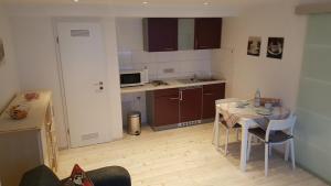 Kuchyň nebo kuchyňský kout v ubytování Apartment Feldmann