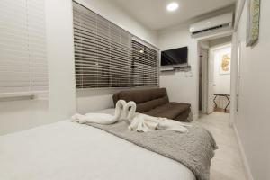 Cama ou camas em um quarto em Hotel Las Lunas
