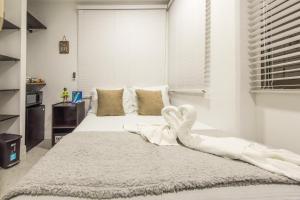 Cama ou camas em um quarto em Hotel Las Lunas