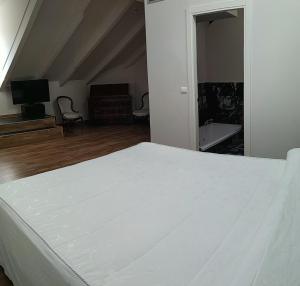 Postel nebo postele na pokoji v ubytování Hostal Siglo XIX
