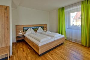 Postel nebo postele na pokoji v ubytování Hotel Restaurant DAS RÖSSL