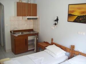 Η κουζίνα ή μικρή κουζίνα στο Hotel Asteria