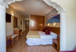 Postel nebo postele na pokoji v ubytování Magic Villa de Benidorm