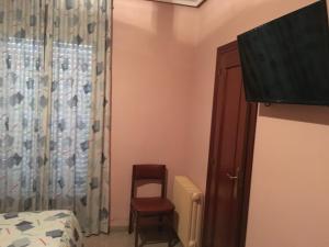 Μια τηλεόραση ή/και κέντρο ψυχαγωγίας στο Hostal Moraleda **
