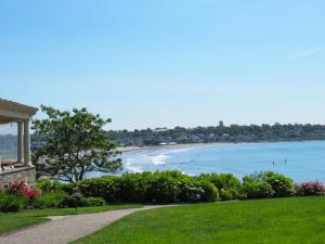 a view of a beach and the ocean at The Chanler at Cliff Walk in Newport