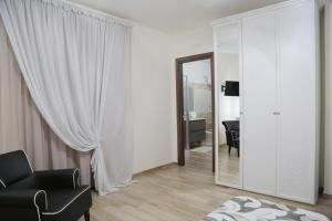 TV a/nebo společenská místnost v ubytování B & B Evergreen