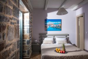 A bed or beds in a room at Mandy Luxury Villa by Cretevasion