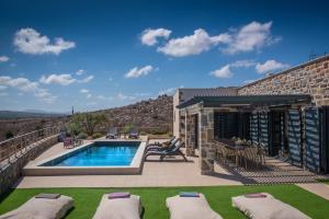 The swimming pool at or close to Mandy Luxury Villa by Cretevasion