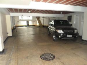 a truck parked in an empty parking garage at HOTEL ESTADUAL adults only in Rio de Janeiro