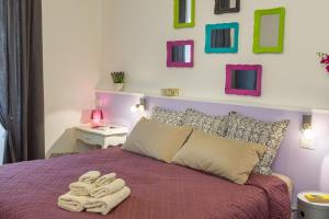 Postel nebo postele na pokoji v ubytování Girovagando B&B
