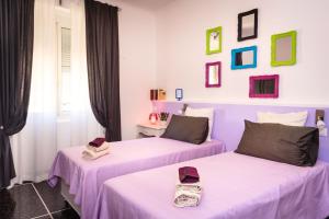 Postel nebo postele na pokoji v ubytování Girovagando B&B