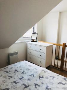 Postel nebo postele na pokoji v ubytování Útulný apartmán na Dolní Moravě
