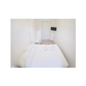 Posteľ alebo postele v izbe v ubytovaní Secret Room Naples