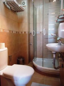 Koupelna v ubytování Hotel Pelikan