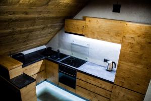 Kuchnia lub aneks kuchenny w obiekcie Apartament Mountain Chalet