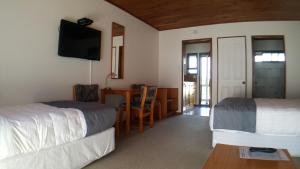 Postel nebo postele na pokoji v ubytování Austria Motel