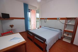 Postel nebo postele na pokoji v ubytování Residence Elite