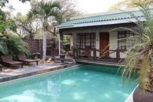 The swimming pool at or close to Royal Game Guest House
