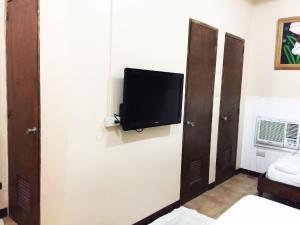 TV a/nebo společenská místnost v ubytování My Vigan Home Hotel