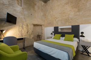 Katil atau katil-katil dalam bilik di La Puerta de Palacio - Adults Only
