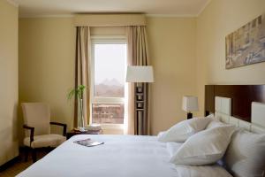 Barceló Cairo Pyramids 객실 침대