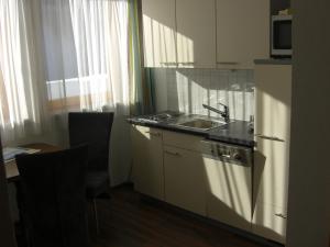Kuchyň nebo kuchyňský kout v ubytování Hotel Garni Ragaz